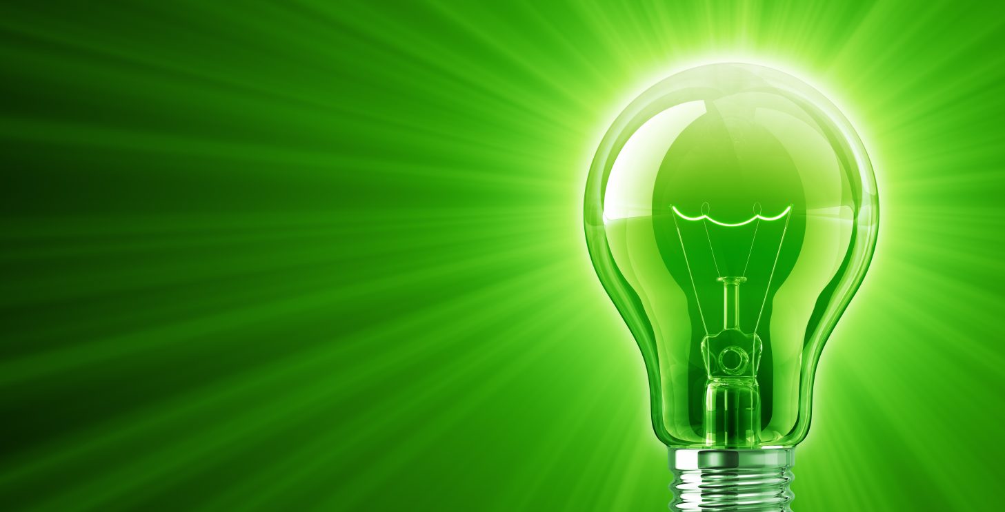 lightbulb A lightbulb shining into a green background